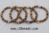 CGB6008 8mm round yellow tiger eye bracelet with skull for men