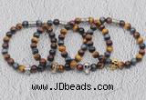 CGB6027 8mm round grade AA colorful tiger eye bracelet with skull for men